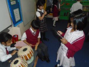 J1 pupils record a soundtrack on their school iPads