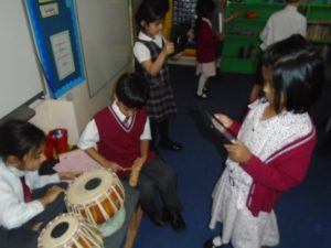 J1 pupils record a soundtrack on their school iPads