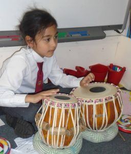 J1 pupil at Highclare St Paul's plays the Tabla